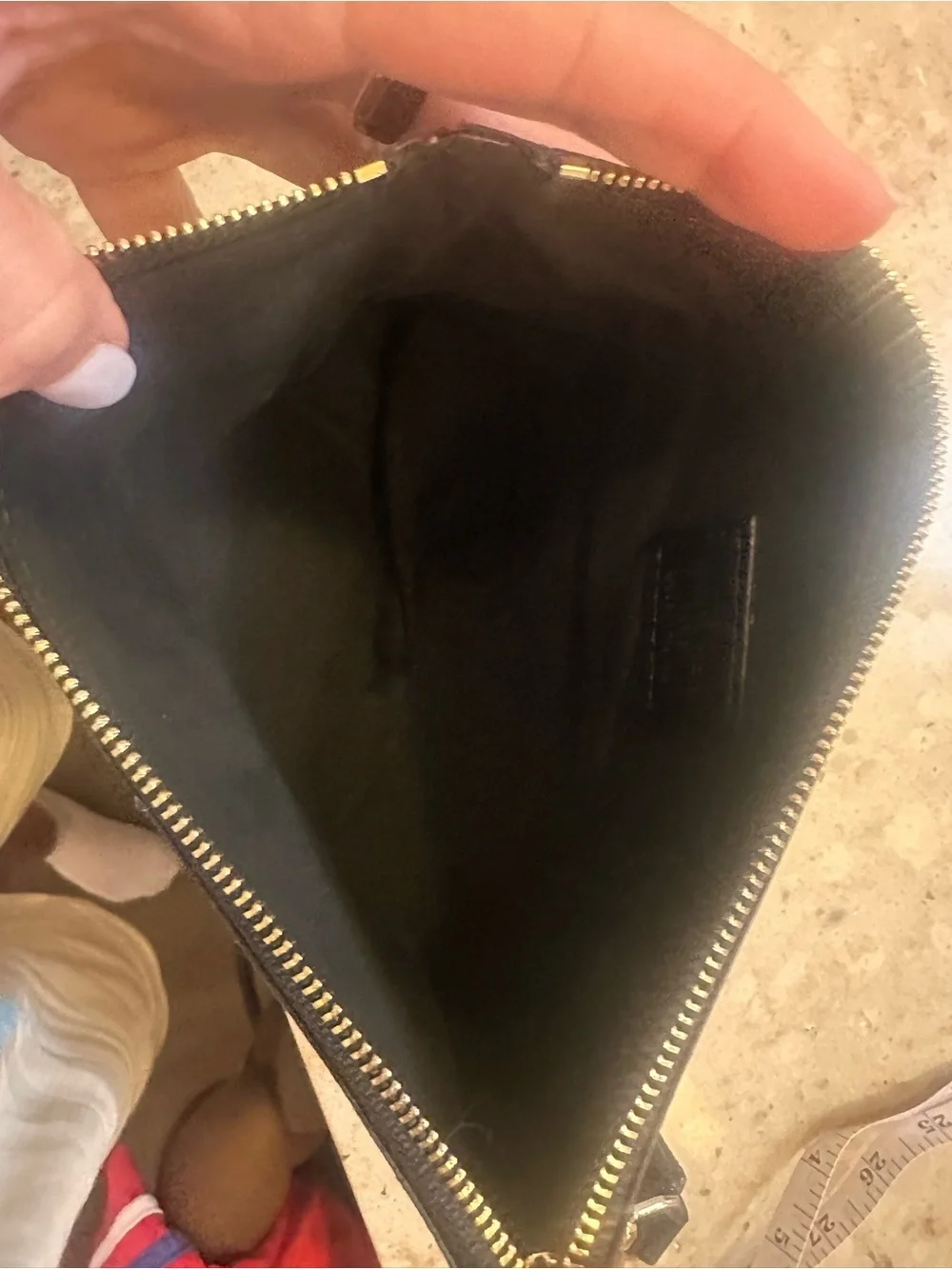 Unlisted sleek wristlet
